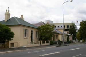 The four houses and Aurora Building behind